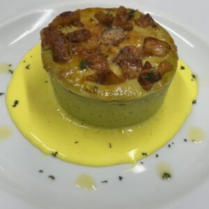 Sformatino di Piselli e Guanciale con Salsa di Curcuma e Parmigiano